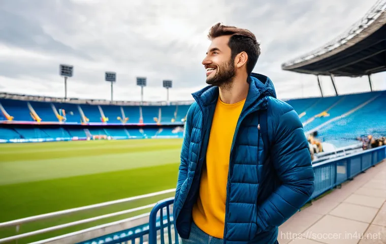 축구 경기 날씨에 따른 준비물 - Layered Clothing for Unpredictable Stadium Weather**
A vibrant, wide-angle shot capturing a person, ...